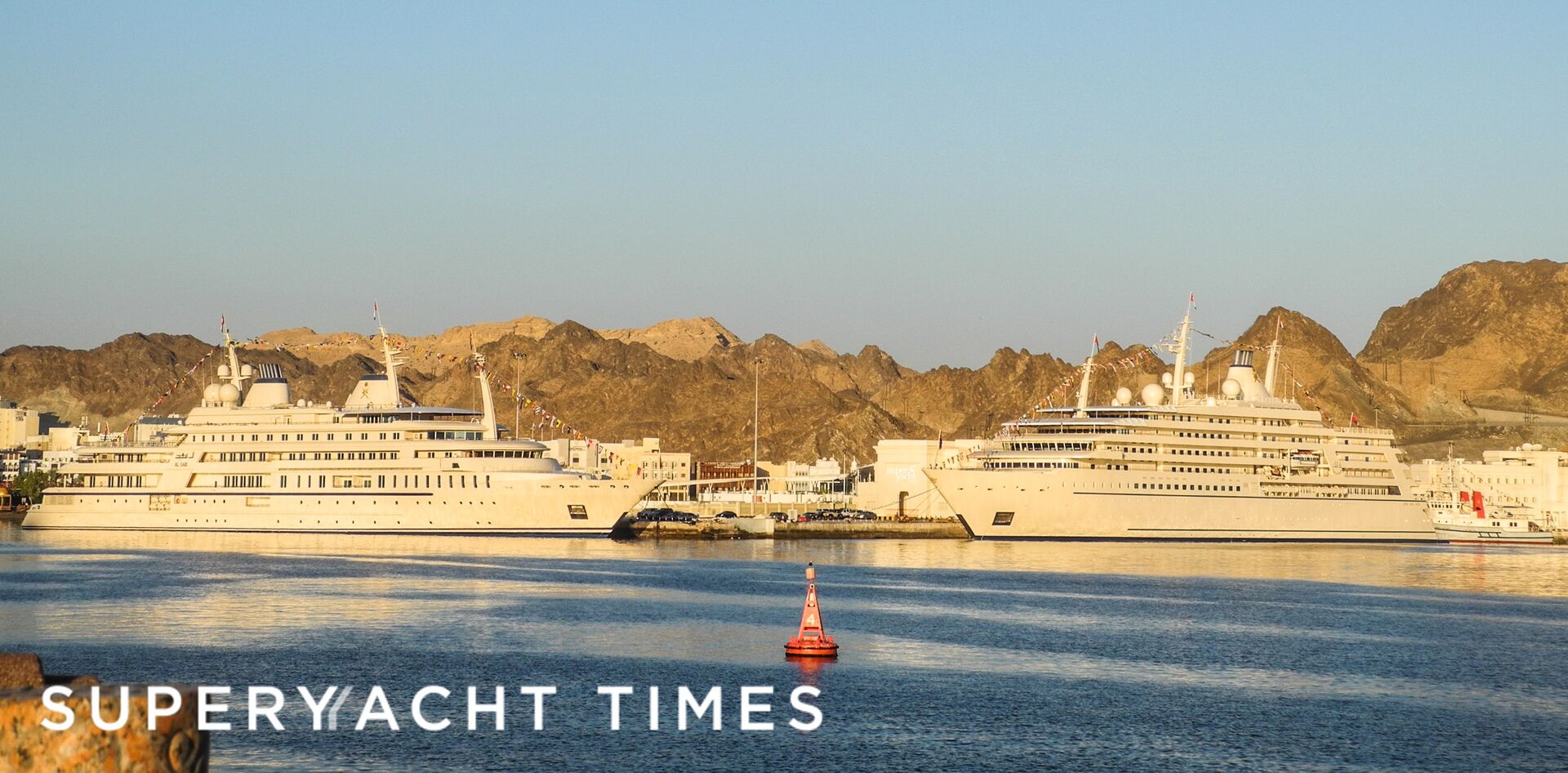 Royal yachts Al Said and Fulk Al Salamah side by side in Muscat