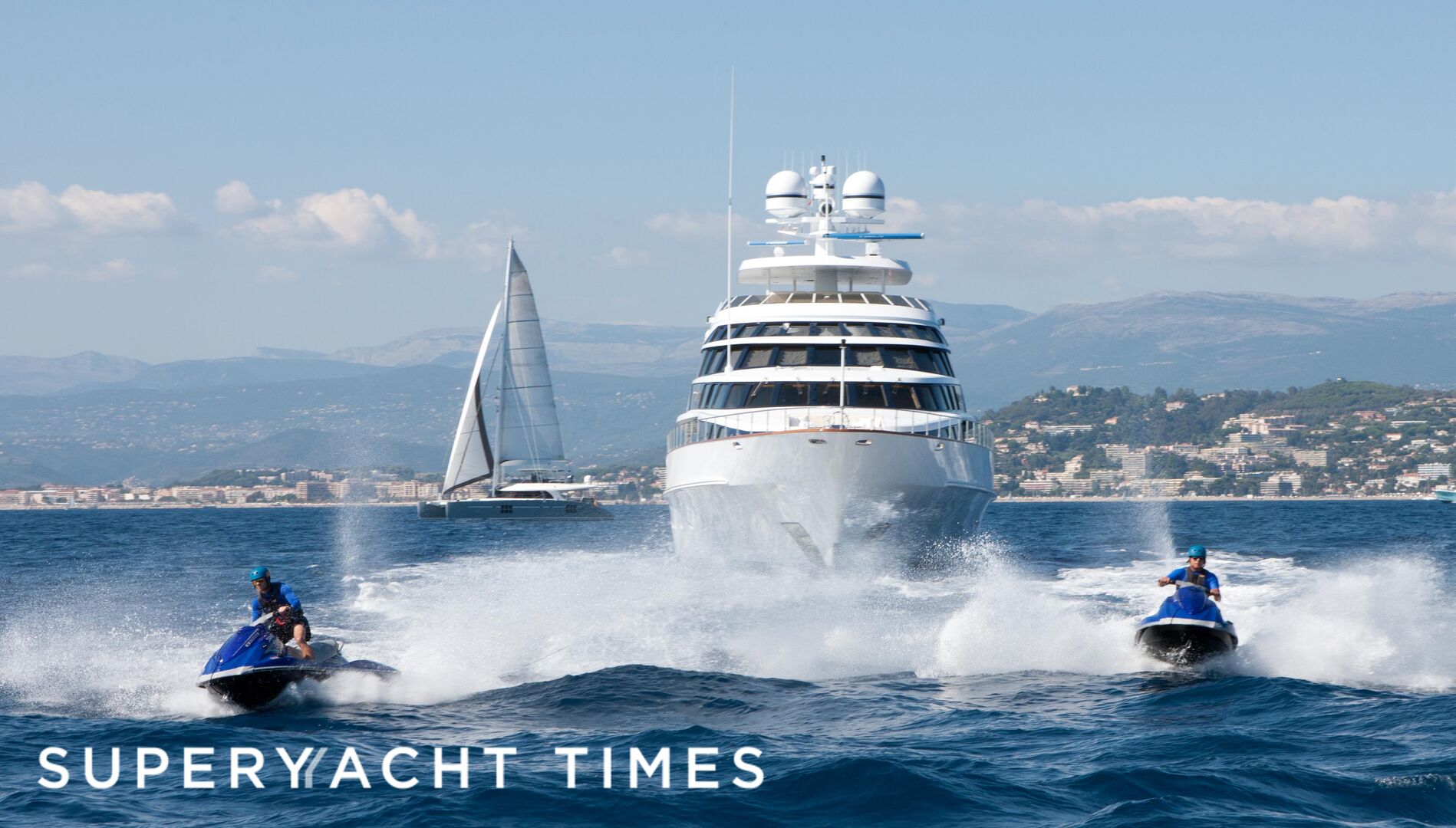 Azzurra II yacht with tenders