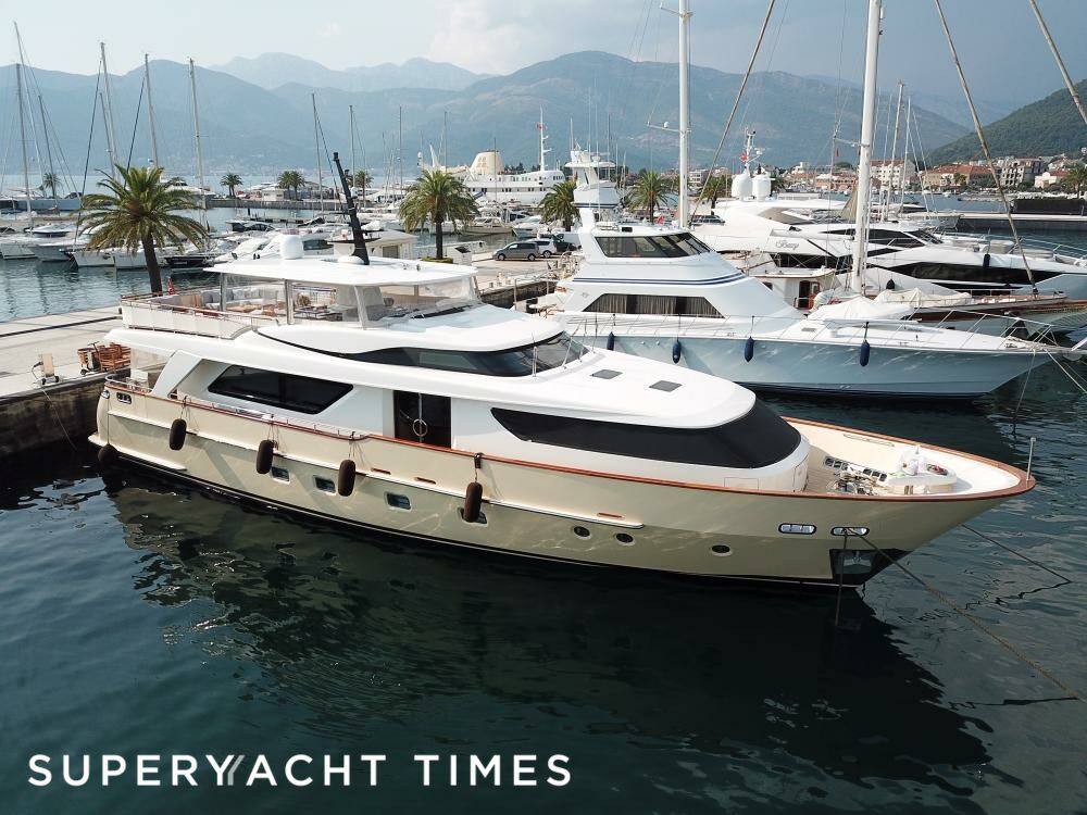 Christina yacht in marina