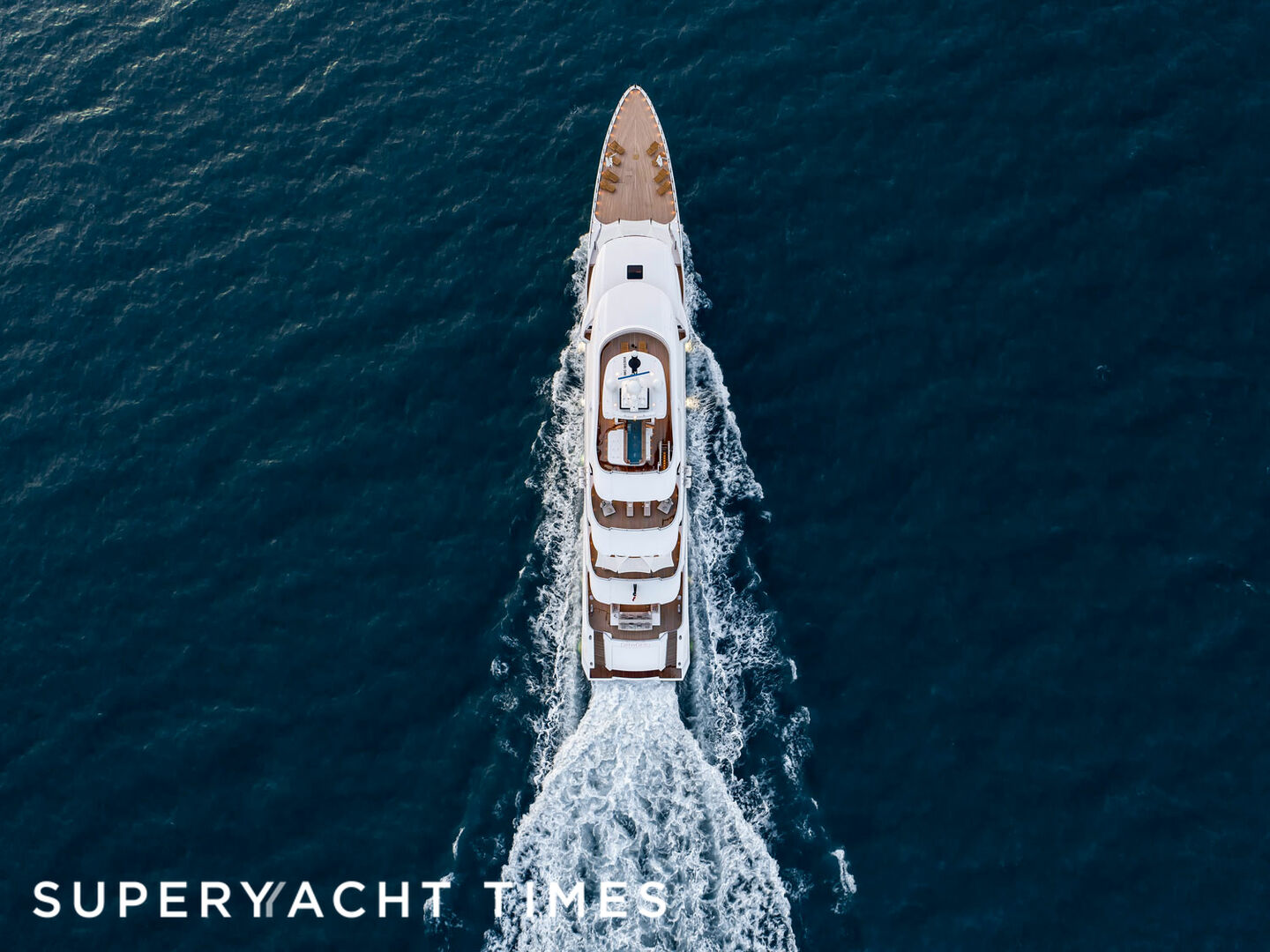 Dragon yacht cruising aerial