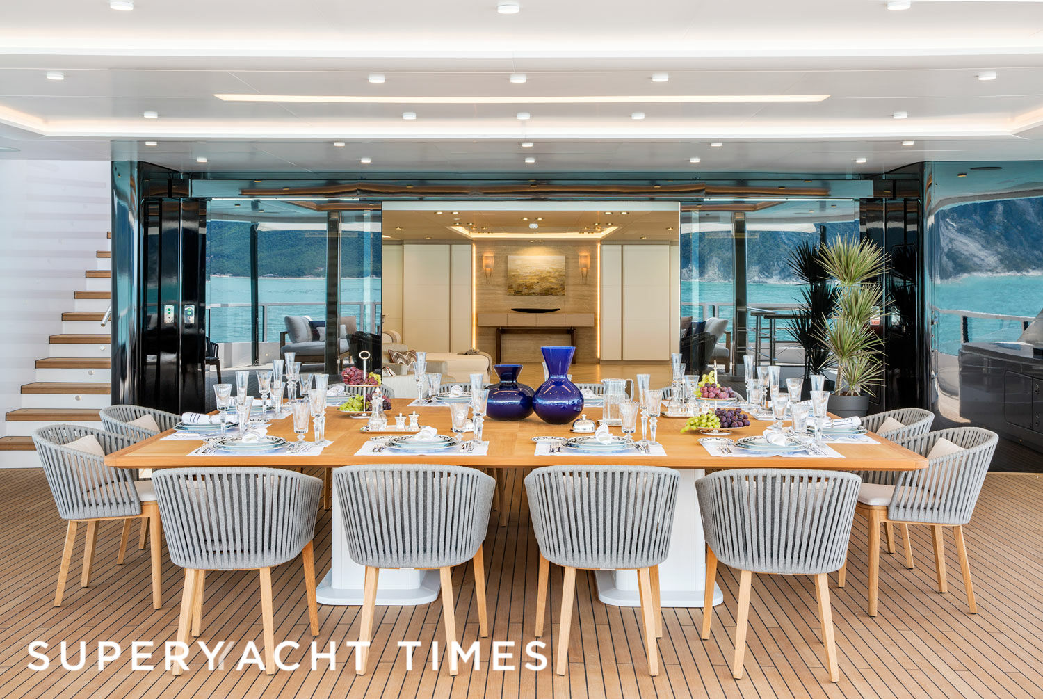 Dragon yacht owner outside dining area