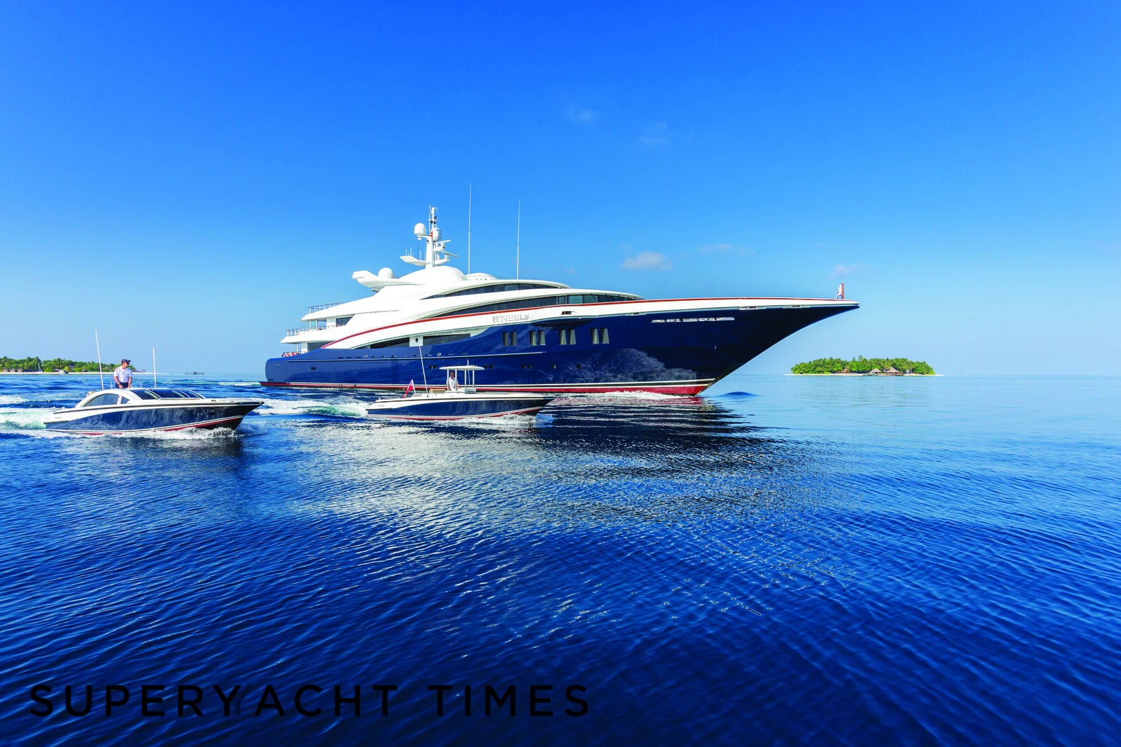Wheels yacht cruising with her tender